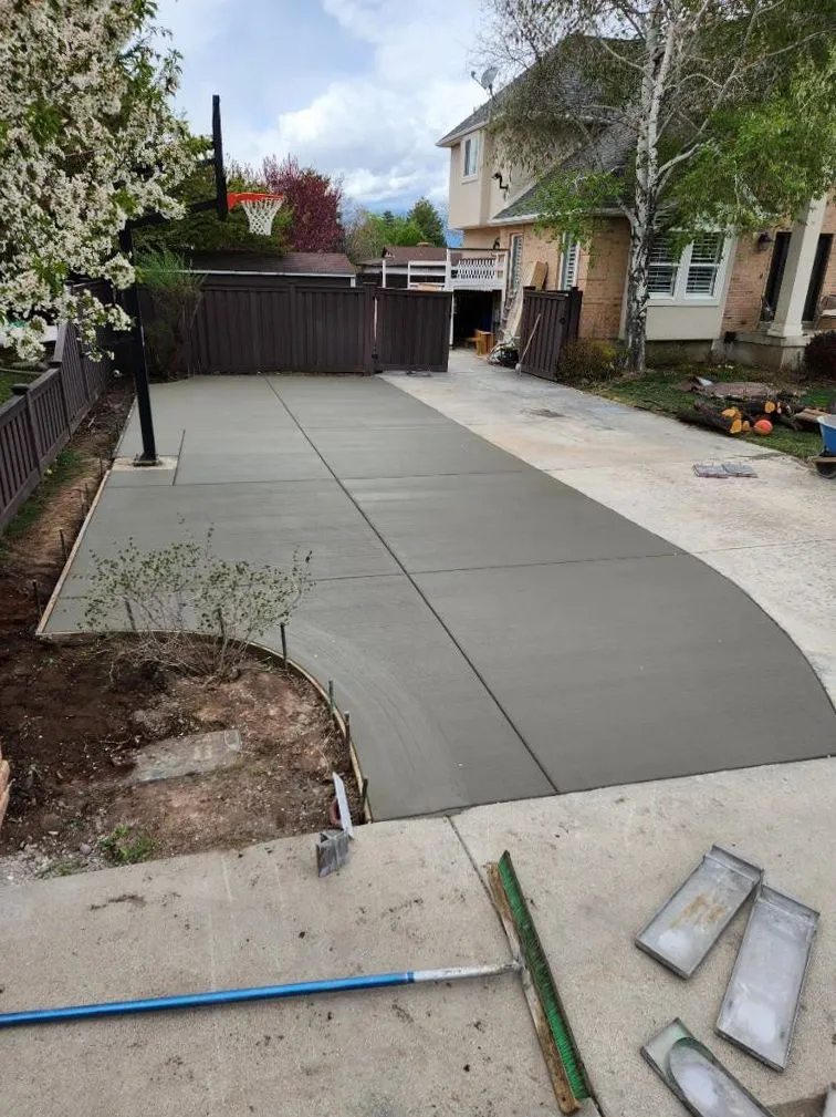 Residential concrete driveway with curved edges