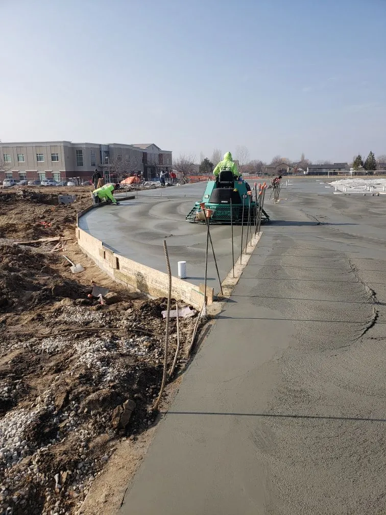 Large commercial concrete pour with power trowel equipment