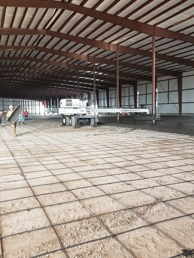 Rebar grid laid out in a commercial building before concrete pour